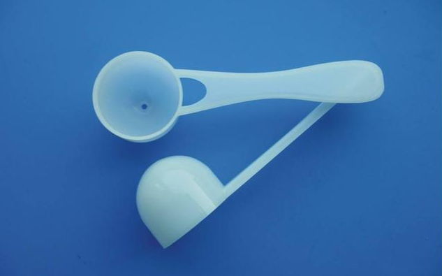 奶粉勺底部的小孔有什么用 奶粉勺底部的小孔会漏出奶粉吗